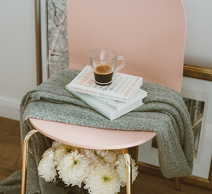 Light pink chair with blanket
