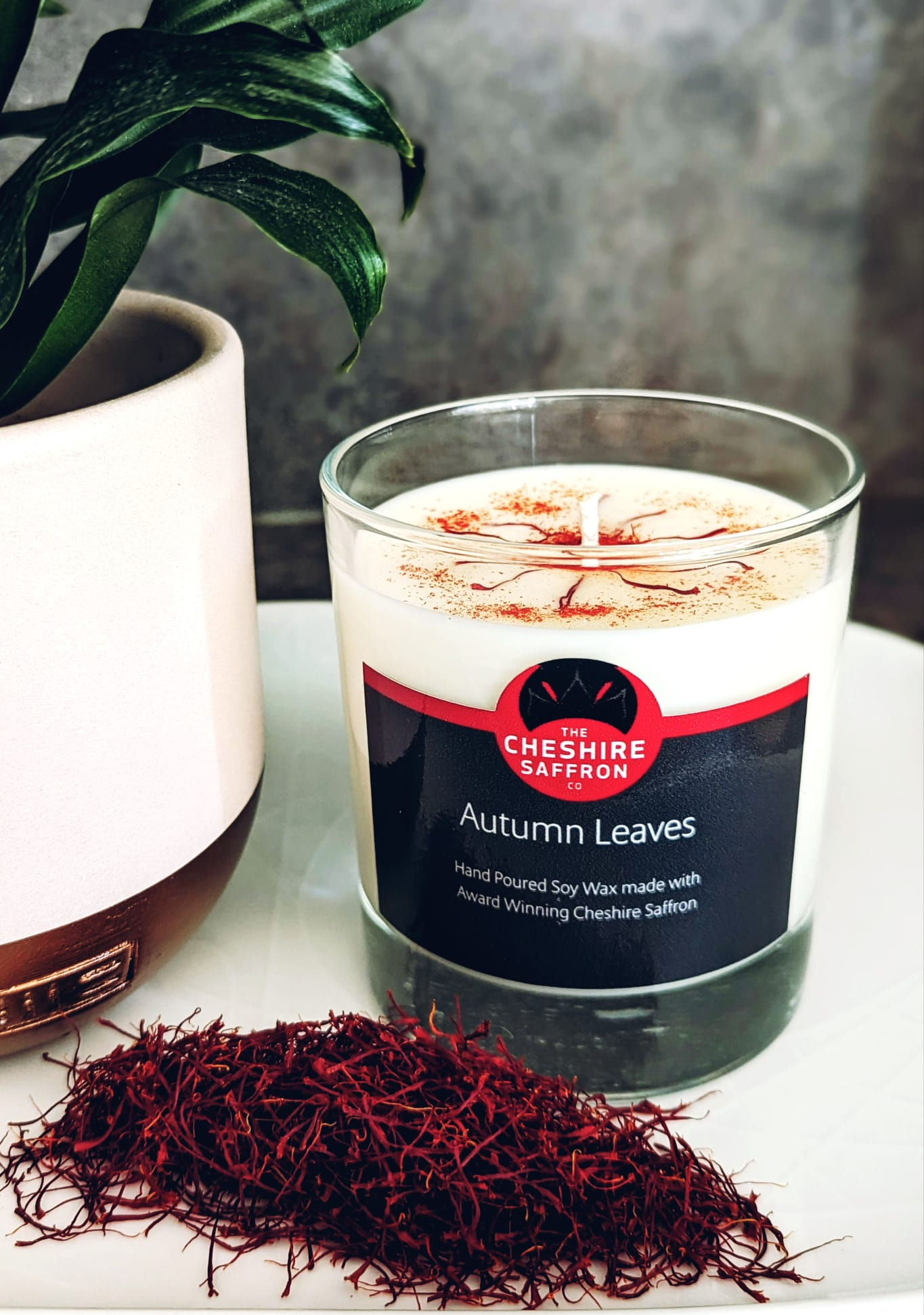 Cheshire Saffron Candles now in glass