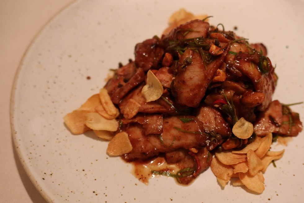 Moo Pad Bai Chamuang