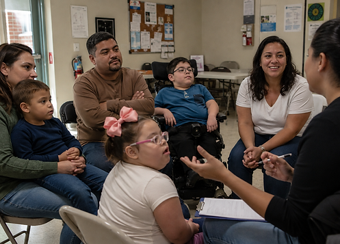 Families participating in a disability advocacy and community support workshop