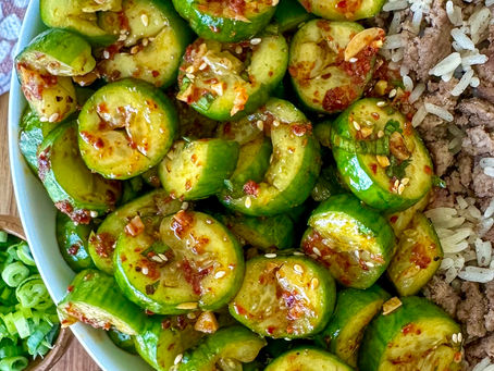 This spicy Korean-inspired cucumber salad is anything but boring! Crisp, smashed Persian cucumbers are tossed in a bold hot honey-lime dressing made with gochugaru, garlic, ginger, coconut aminos, toasted sesame oil, and a little gochujang. The result is crunchy, spicy, tangy, slightly sweet, and incredibly refreshing.