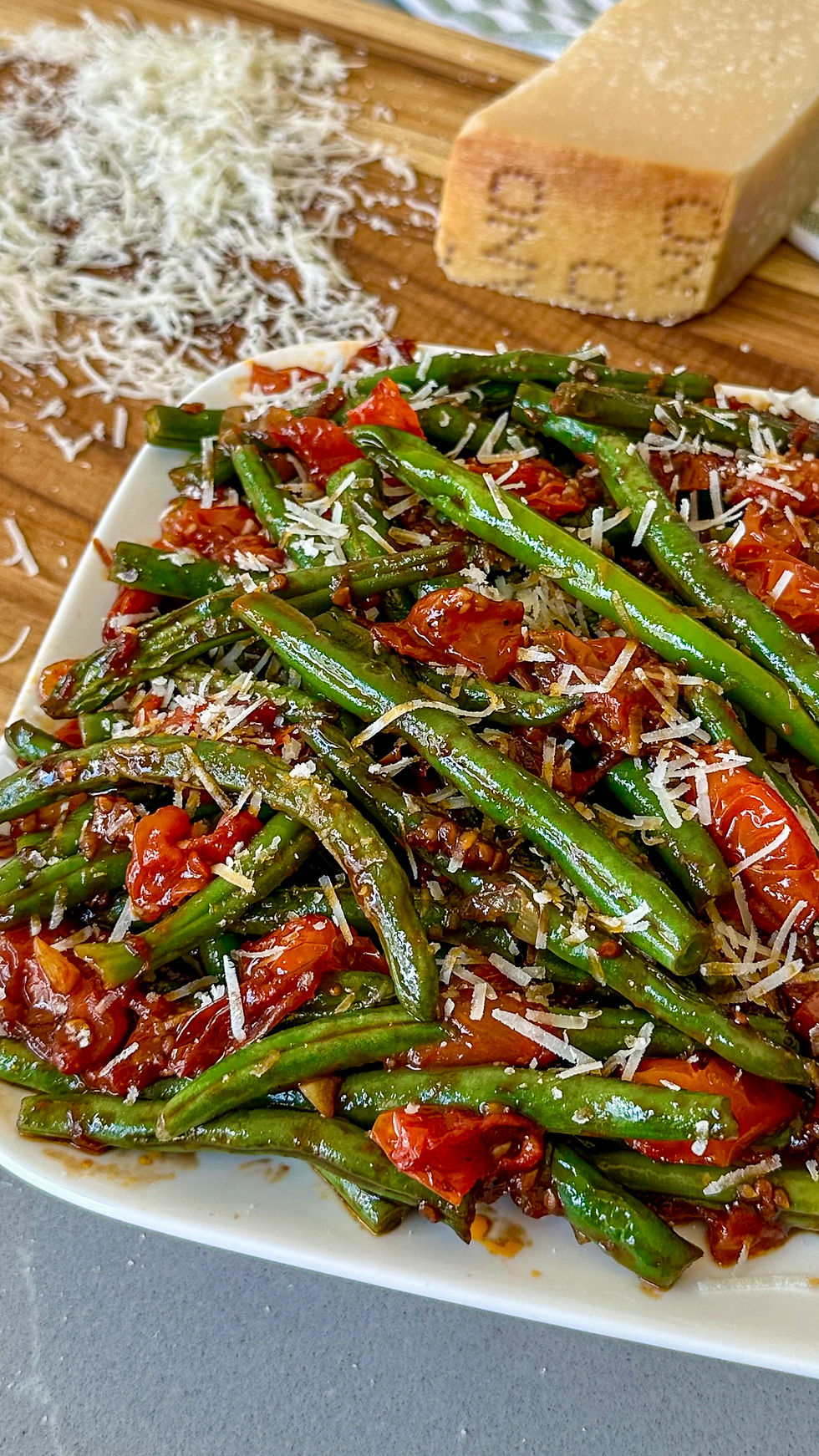 There's something incredibly satisfying about a side dish that feels both elegant and effortless, and these Burst Tomato Green Beans with Parmesan and Balsamic Glaze deliver exactly that in about 20 mintues. Crisp-tender green beans are tossed with juicy cherry tomatoes that soften and burst as they cook, creating a light, naturally sweet sauce that coats every bite.