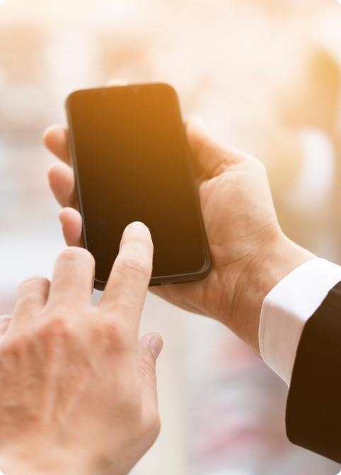 close-up-hands-holding-mobile-phone (1) 1.jpg