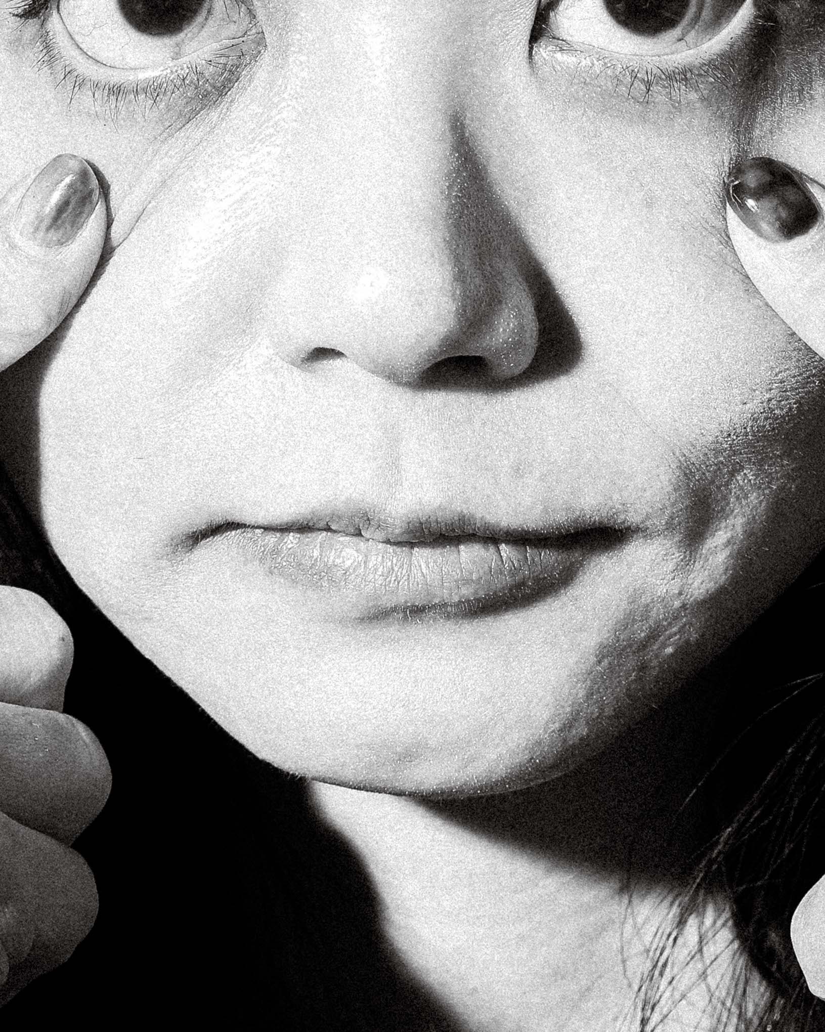 a photograph of a girl and the expression in her eyes