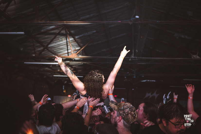 Crowd surfing fans during August Burns Red set in San Antonio