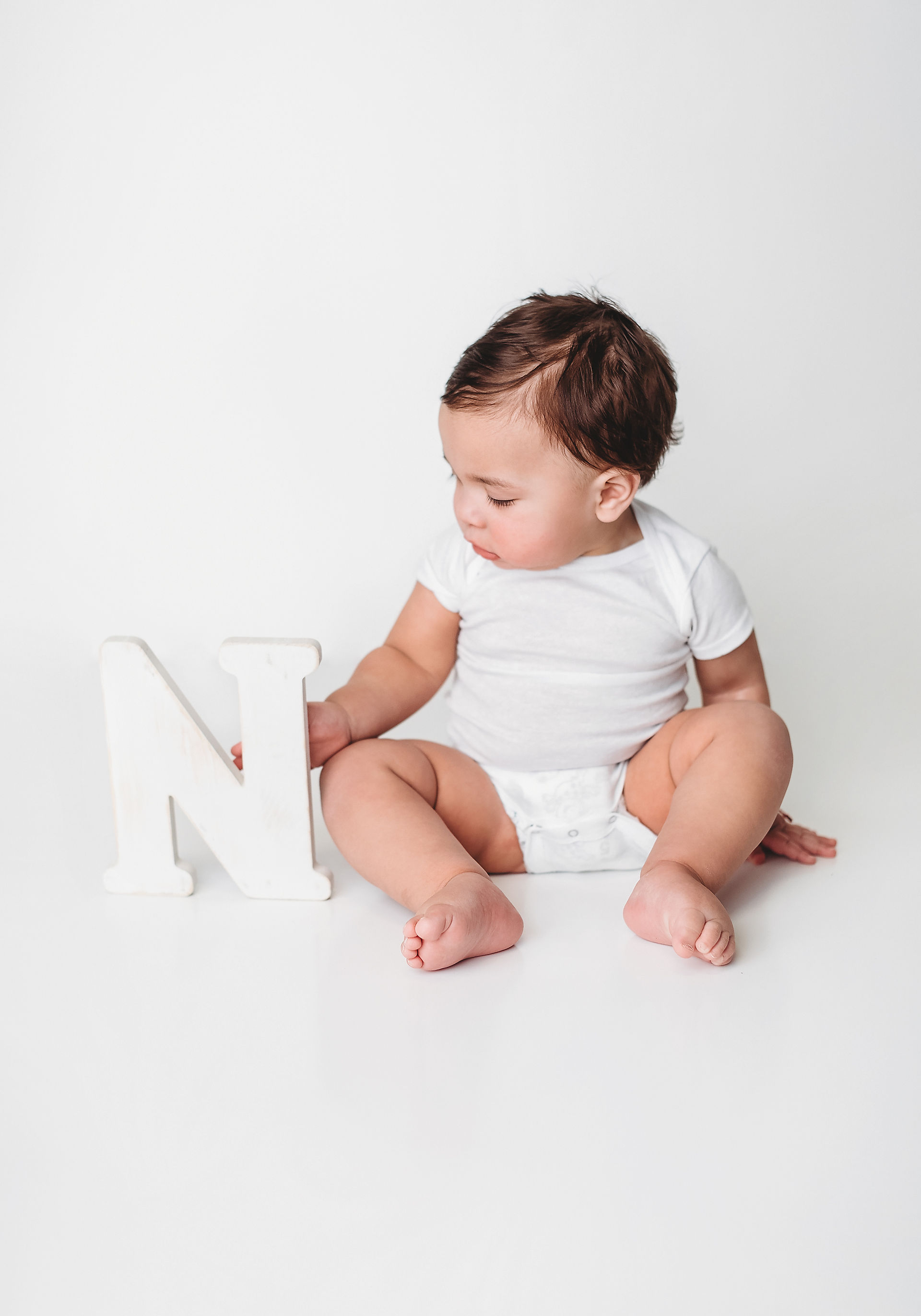 Baby's simple portraits before cake smash photo shoot