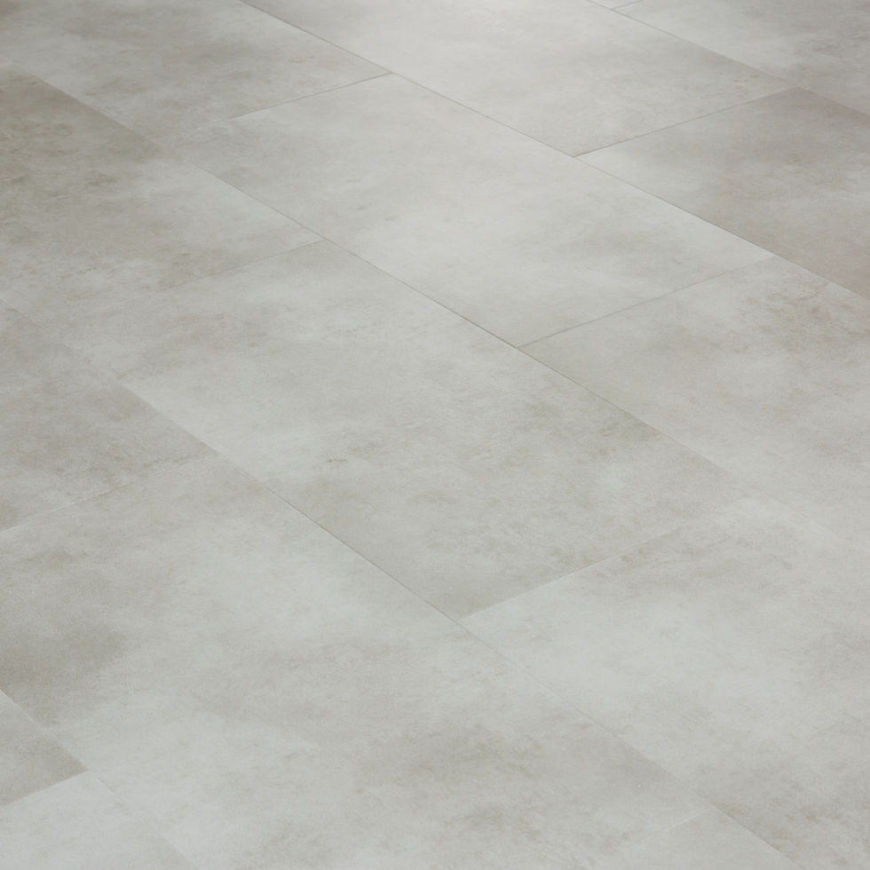 Close-up of Shale light grey LVT tile highlighting the subtle stone pattern and durable surface.