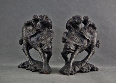 Thumbnail: A pair of Antique Chinese 19th century Qing Dynasty Silver Inlaid Rosewood Buffalo Sculptures