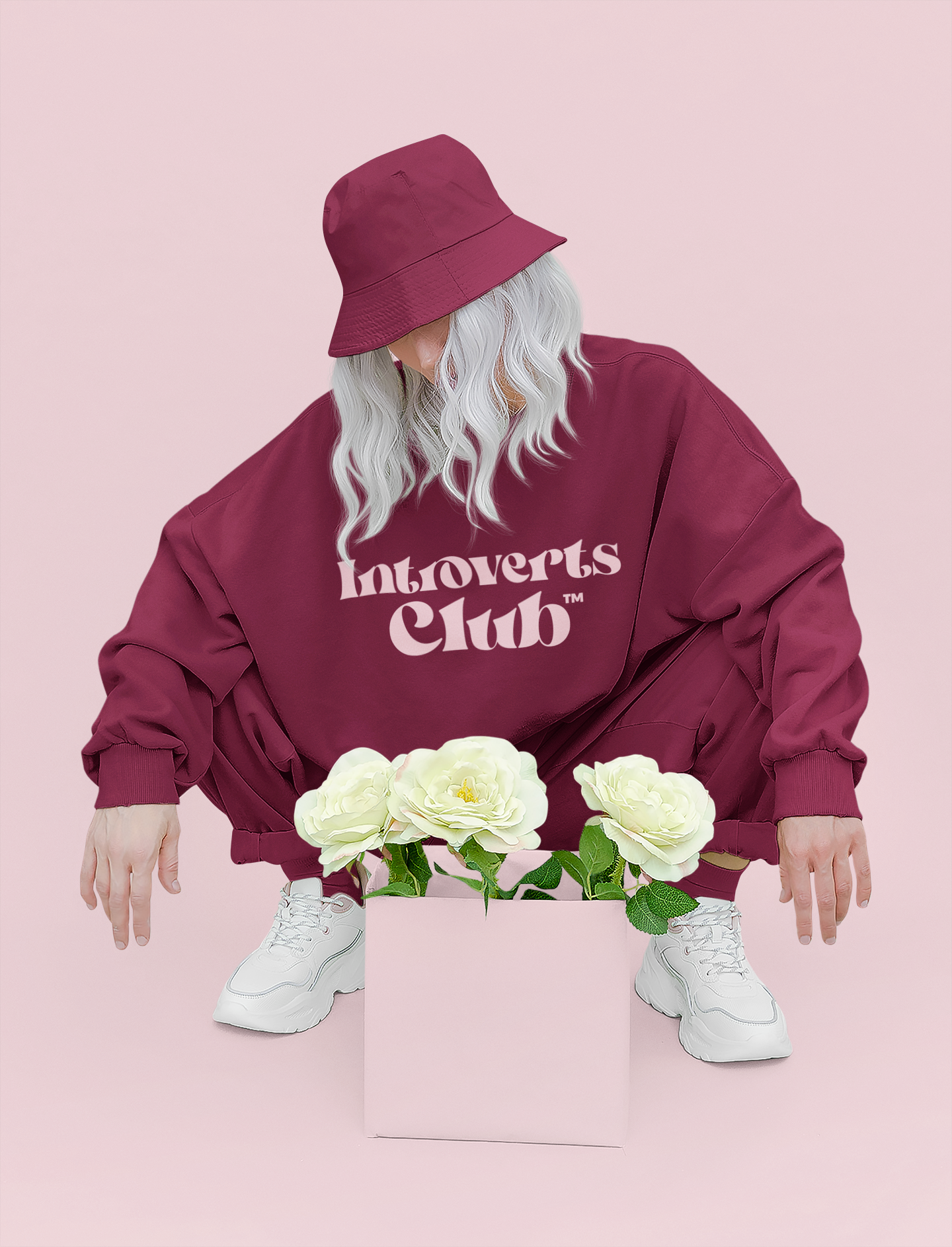 sweatshirt-mockup-of-a-woman-looking-at-some-flowers-in-a-studio-43689-r-el2.png