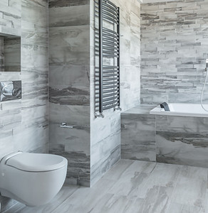 Modern bathroom with professionally installed wall and floor tiles