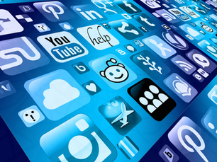 Blue collage of social media app icons including YouTube, Twitter, Pinterest, LinkedIn, Reddit and cloud symbols on a digital background