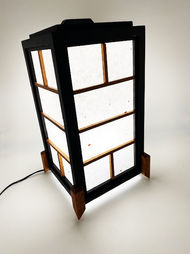 Japanese style timber lantern with paper screen and timber feet