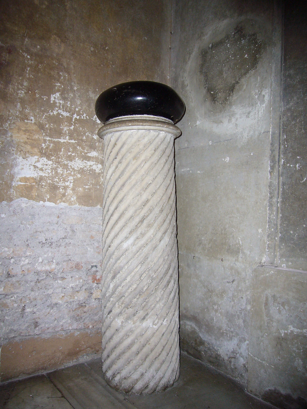 The devil's stone thrown at St. Dominic in Santa Sabina.