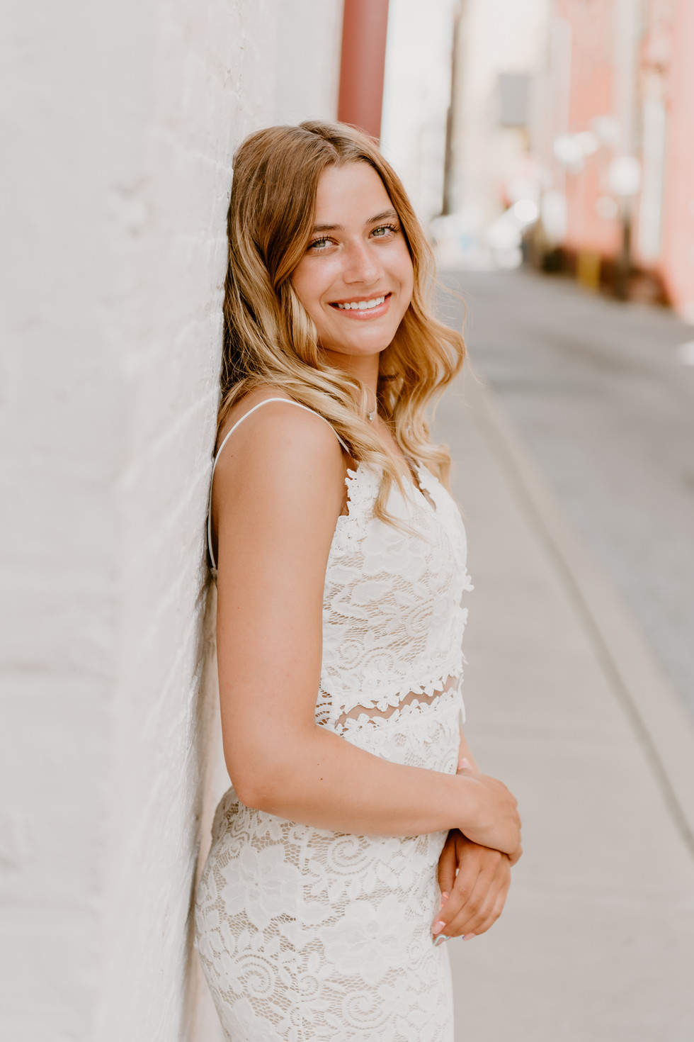 high school senior getting senior pictures in Downtown York, PA