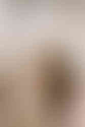 bride and groom at wedding reception donut bar