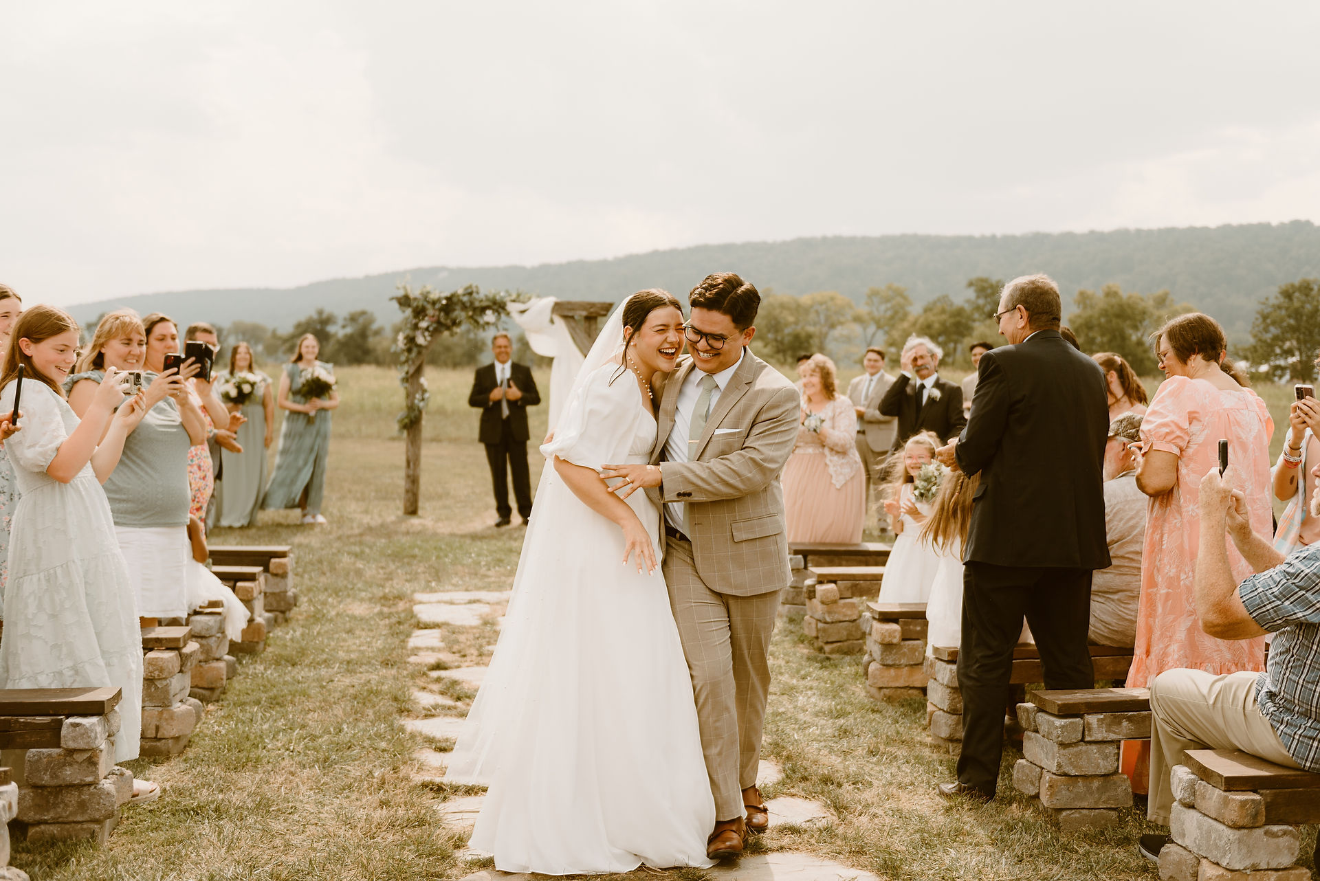 bride and groom at wedding altar