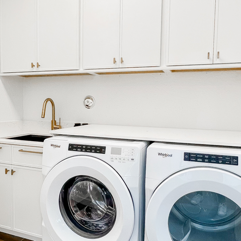 Laundry room cabinets with built-in sink for Palm Beach utility rooms, combining style and functionality