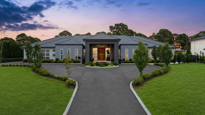 Front driveway and landscaped entry to Halmstad House, custom acreage home in Luddenham NSW