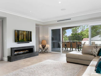 Beecroft Custom New Home Design by Distinct Inovations Louge beige carpet white walls fireplace