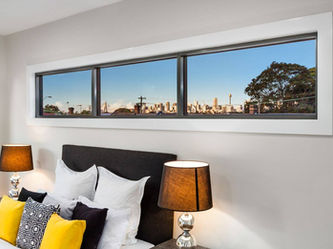 Hill St House small-lot residence featuring a high-efficiency 327m² footprint and cubic architectural forms optimized for dense urban living city view