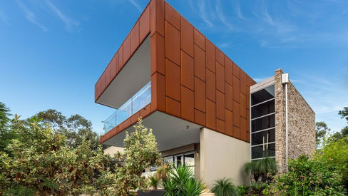 Contemporary upper-storey exterior with feature cladding at Mt Riverview House