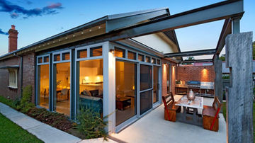 Glazed rear extension and landscaped garden at Creewood House