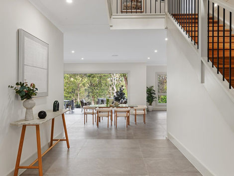 Malton Road II House two storey modern new home  oak staircase black balustrade beige tiles oak furniture