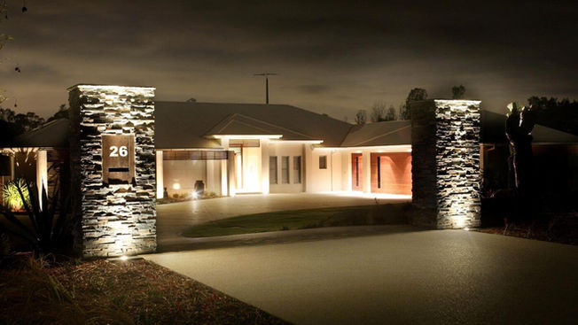 Illuminated entry and driveway to Portrush House in Luddenham NSW
