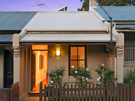 Heritage Conservation renovation on a restricted narrow site, featuring an internal courtyard and a master suite addition designed for maximum spatial efficiency.