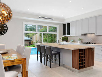 Beecroft Custom New Home Design pale grey kitchen with walnut accent beige floor tiles
