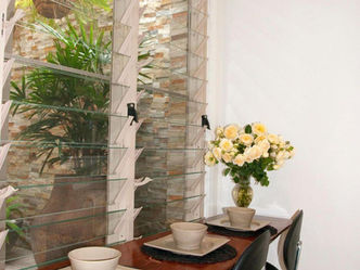 inner-west heritage renovation on a restricted narrow site breakfast bar looking to courtyard