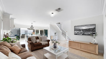 Open-plan family living area within the renovated River Road Villa House