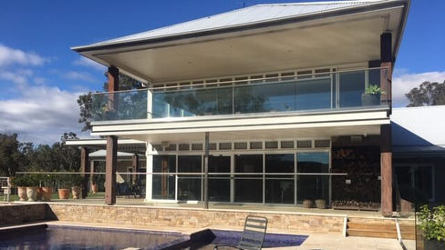 Rear two-storey extension overlooking the swimming pool at Hidden Valley House