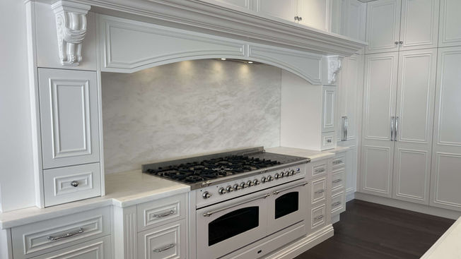 French Provincial kitchen cabinetry and freestanding cooker at Crawford Creek House