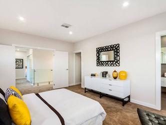 Hill St House small-lot residence featuring a high-efficiency 327m² footprint and cubic architectural forms optimized for dense urban living master suite