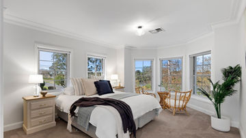 Upper-floor bedroom with river views at River Road Villa House in Leonay