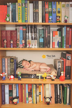 Newborn Murilo - Estante de livros