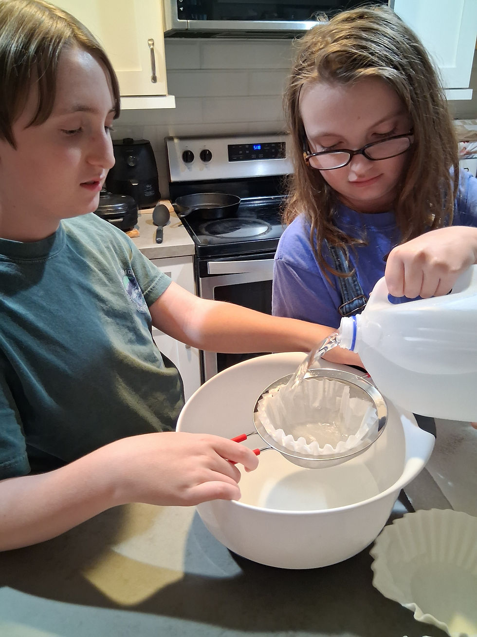 Boy and girl working in the kitchen