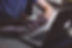 Person's two hands using the touchpad scrolling on a Apple Macbook laptop