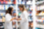 Clean and well-stocked pharmacy shelves with skincare and wellness products