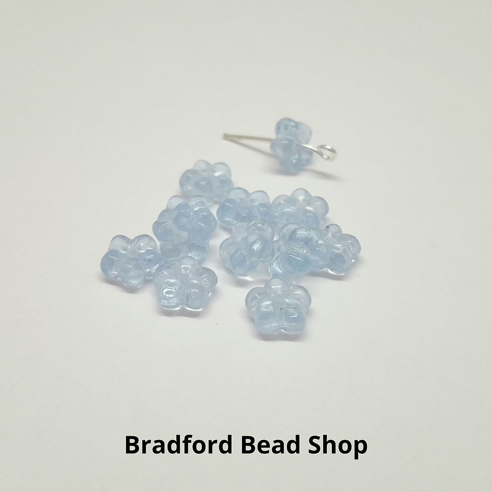 Thumbnail: Glass Flower Beads - Light Blue Translucent - 7mm x 3mm