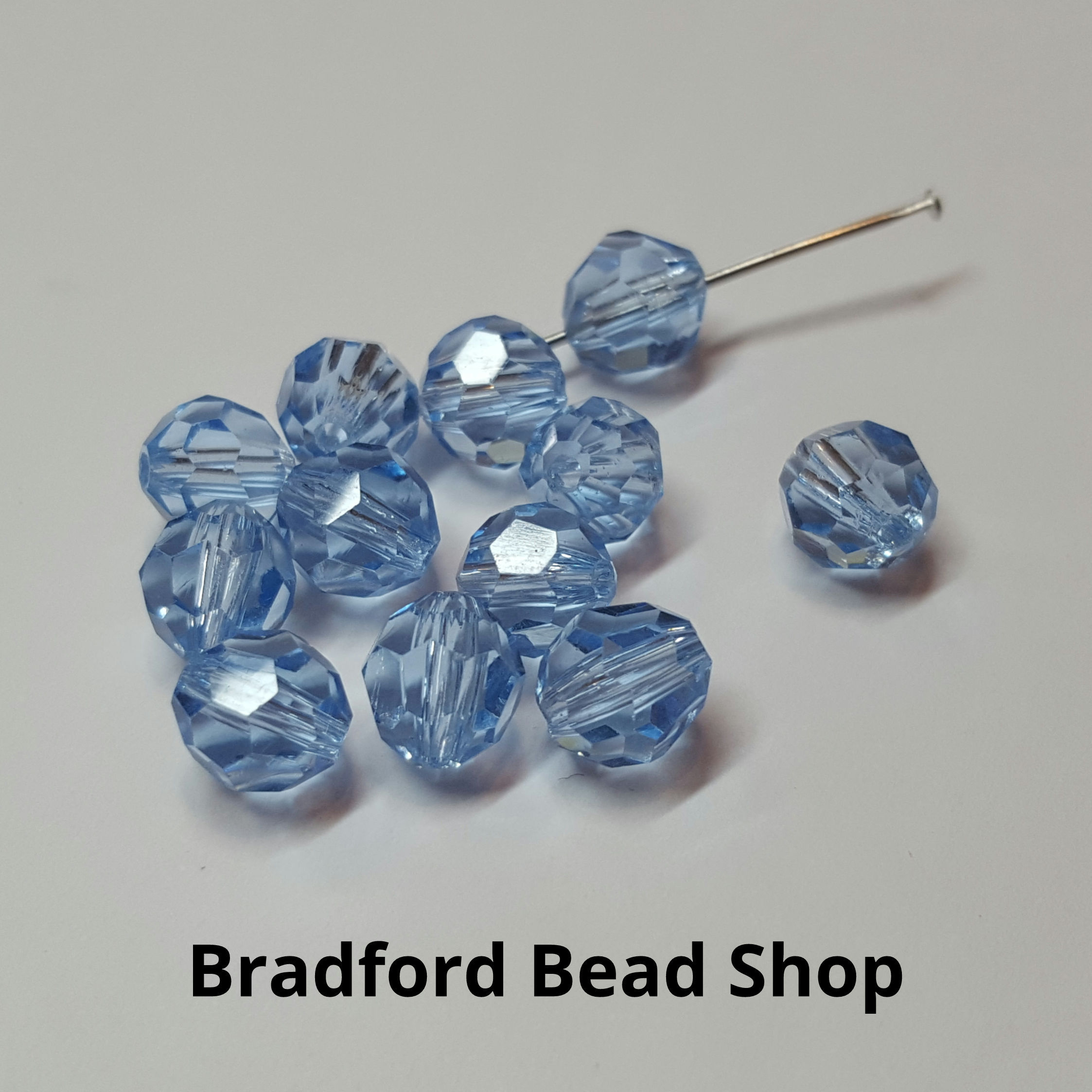 Glass Faceted Rounded Beads - Ocean Blue Translucent - 7mm 