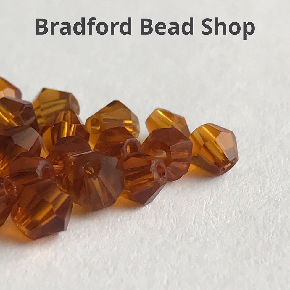 Thumbnail: Machine Cut Bicone Glass Beads - Topaz Translucent - app. 4mm