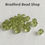 Thumbnail: Machine Cut Bicone Glass Beads - Light Green Translucent - 4mm
