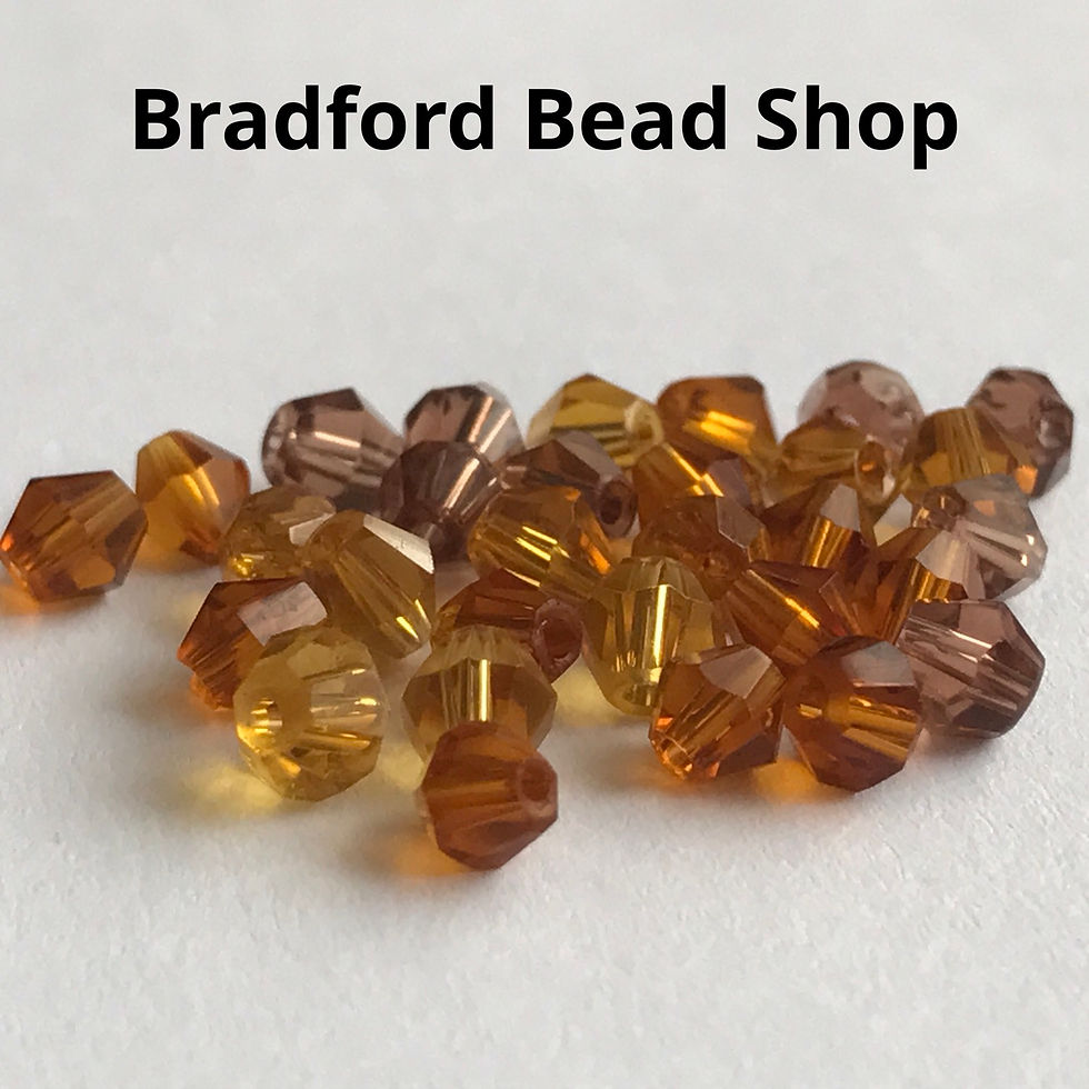 Thumbnail: Machine Cut Bicone Glass Beads - Topaz Mix Translucent - 4mm