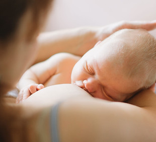 Mother Breastfeeding Baby