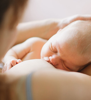 Mother Breastfeeding Baby