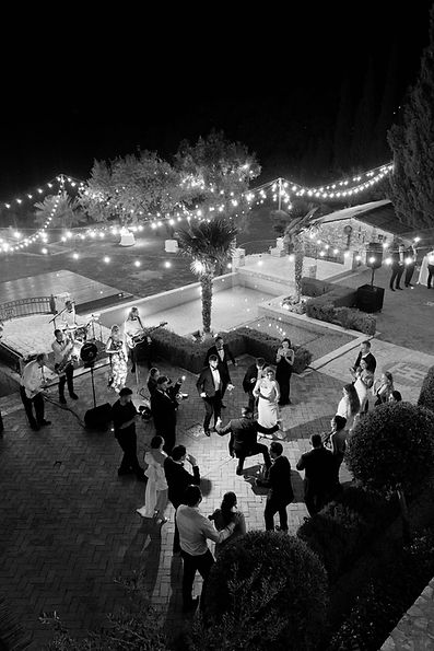 the supershakers perform oustide at a destination wedding
