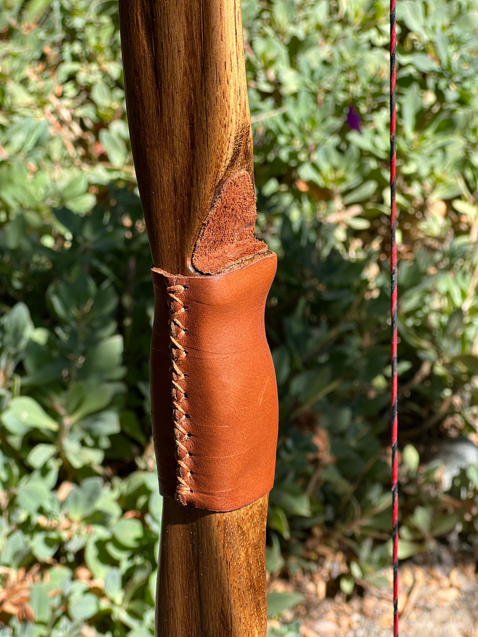 Hickory longbow with cut in arrow shelf