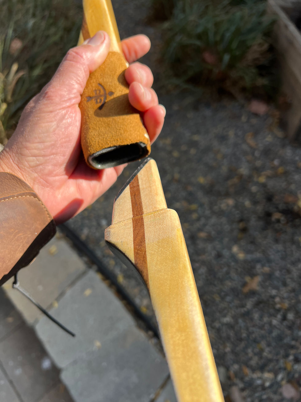 Maple two-piece takedown longbow